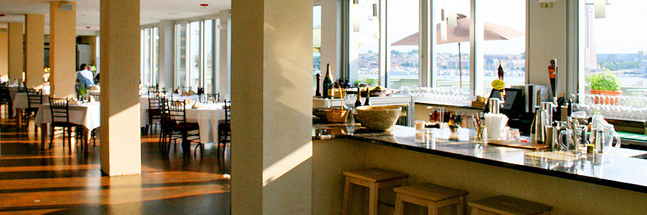 The Olive Room rooftop restaurant looks out over the Harbor