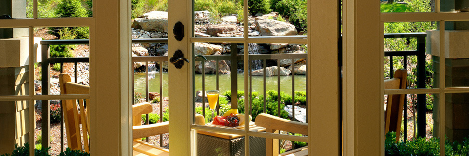 A guestroom veranda with a view of the rock garden